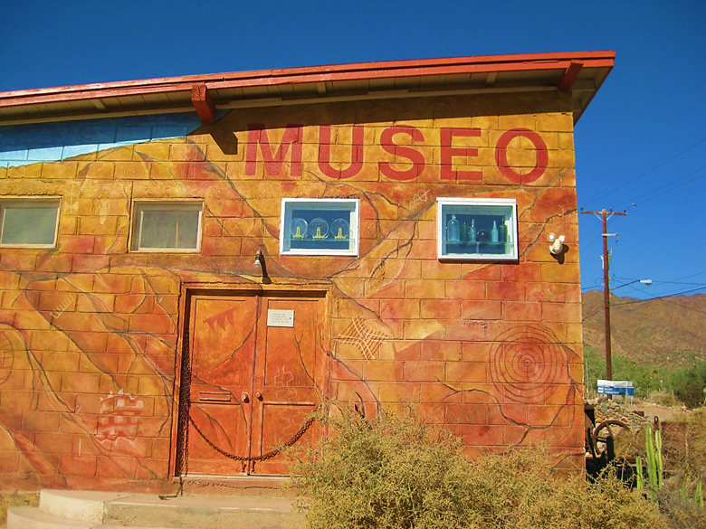 A sign on the side of a building Description automatically generated