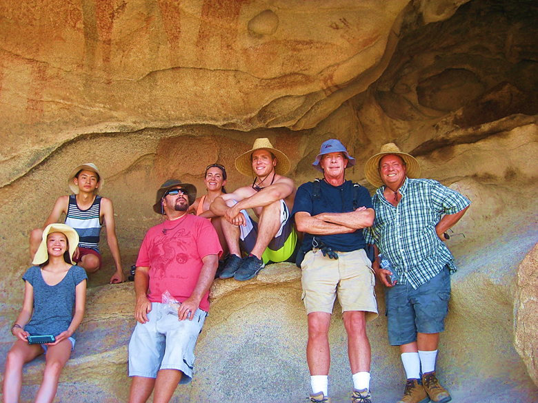 A group of people posing for a photo Description automatically generated