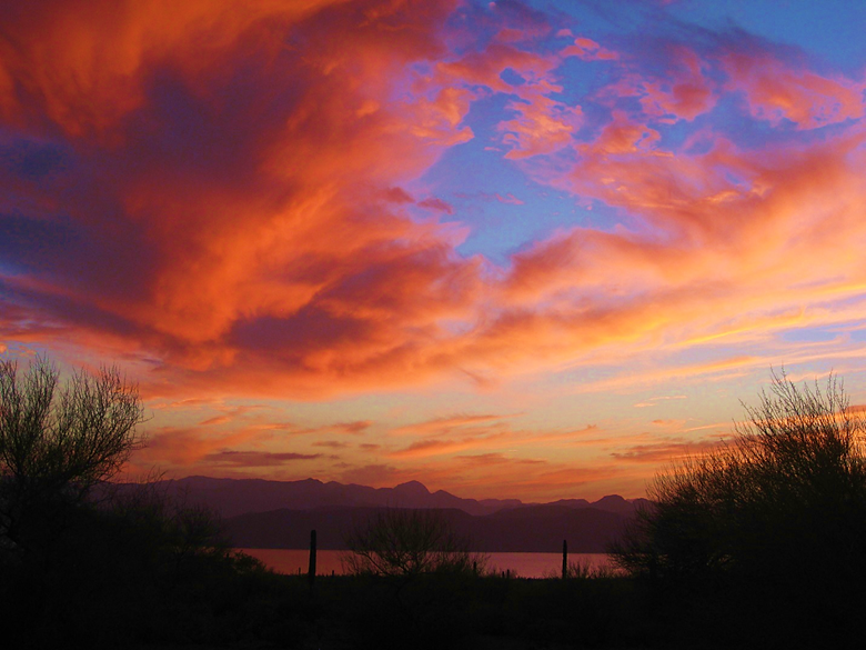 Clouds in the sky at sunset Description automatically generated